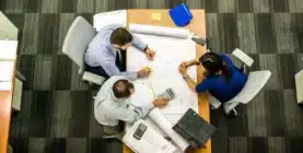 top view of a group of workers around a table