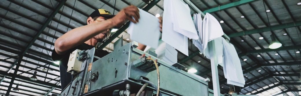 work instructions being printed in a factory