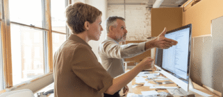 Colleagues discussing erp implementation challenges
